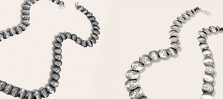 Two pearl necklaces on a light pink background