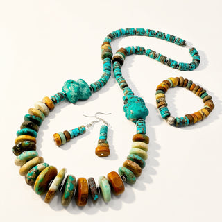 Turquoise and brown beaded necklace with matching earrings on a white background