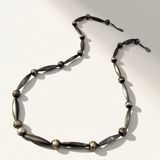 Silver necklace on a white background