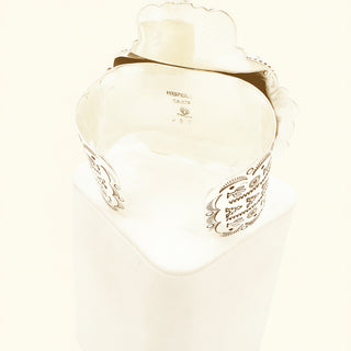 Cuff Stamp with intricate design on a white background