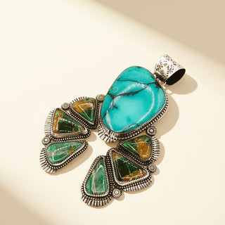 Turquoise pendant on a beige background