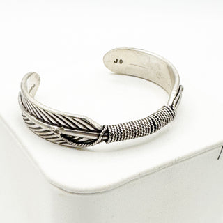 Jason Ogg Feather Cuffs