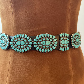 Turquoise belt on a brown background