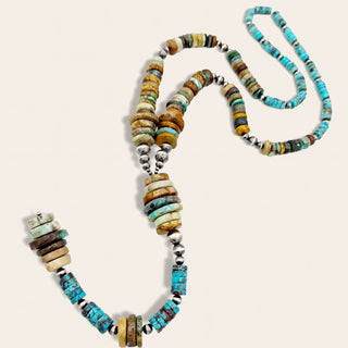 Necklace with multicolored beads on a light background