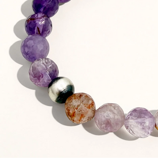 Multicolored beaded bracelet on a white background