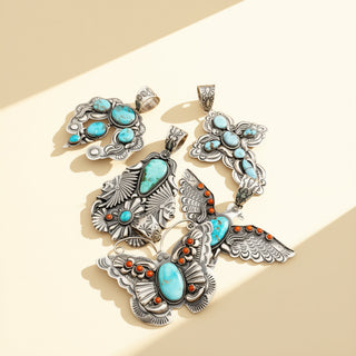 Pendants with turquoise stone on a beige background