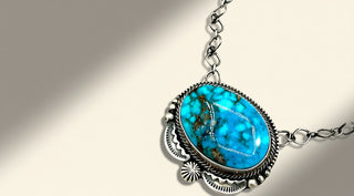 Turquoise necklace on a beige background