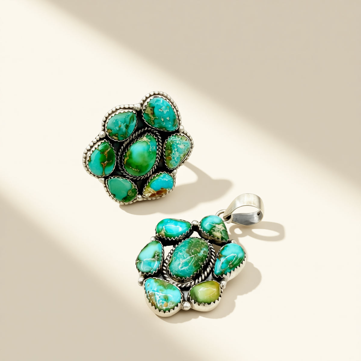 Turquoise stone jewelry set on a beige background