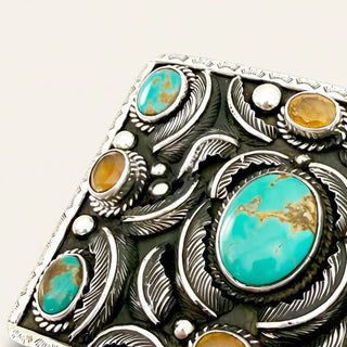 turquoise jewelry on a beige background